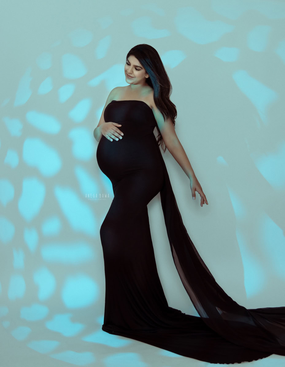 Luxury Pregnancy Shoot in Delhi: Black Off-Shoulder with Trail, Light Play, by Anega Bawa Photography, Gurgaon Noida.