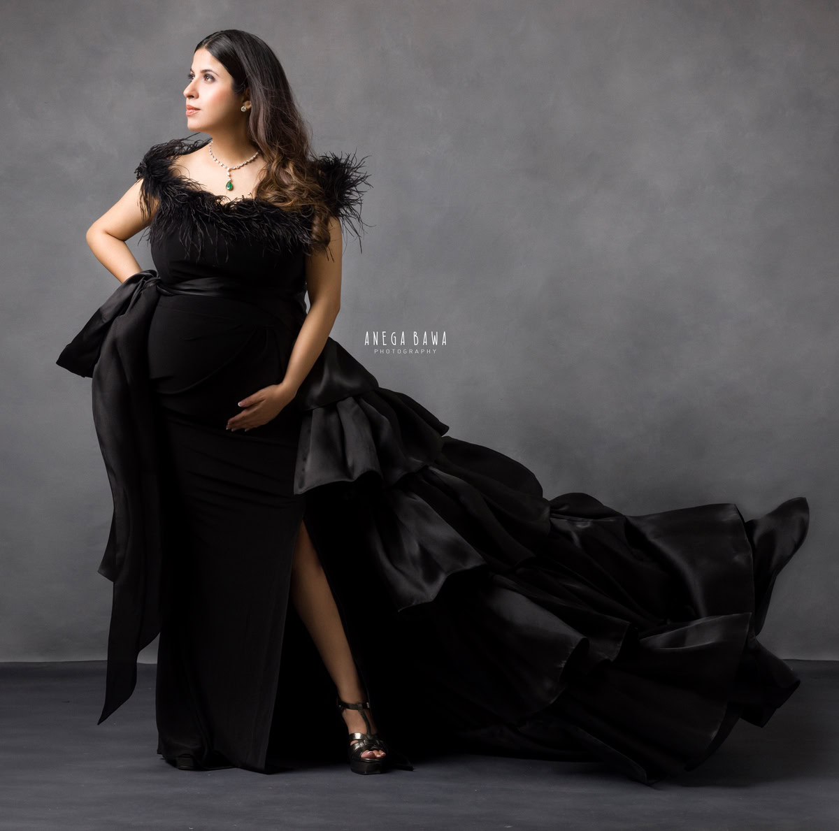 Maternity Photography in Delhi: Black Gown with Trail, Grey Backdrop, by Anega Bawa, Photographer Gurgaon Noida.