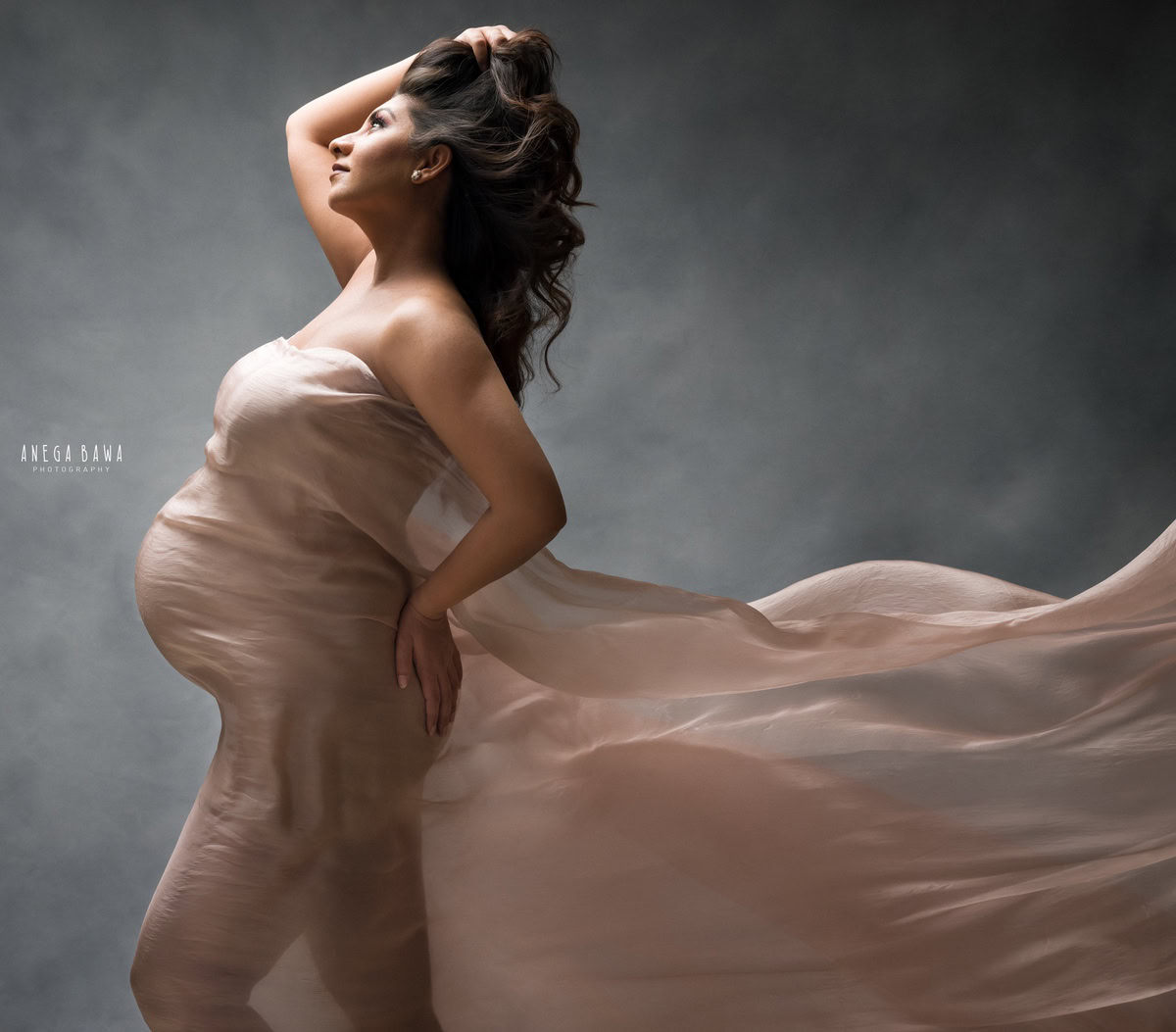 Maternity Photoshoot in Delhi: Peach Wrap, Grey Backdrop, by Anega Bawa Photography, Gurgaon Noida.