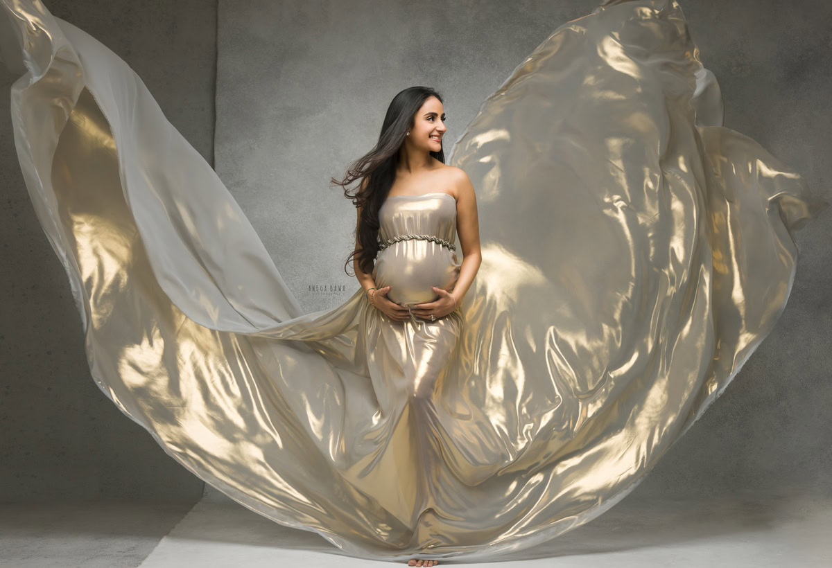 Pregnancy Photographer in Delhi: Golden Shimmer Wrap, Grey Backdrop, by Anega Bawa Photography, Gurgaon Noida.
