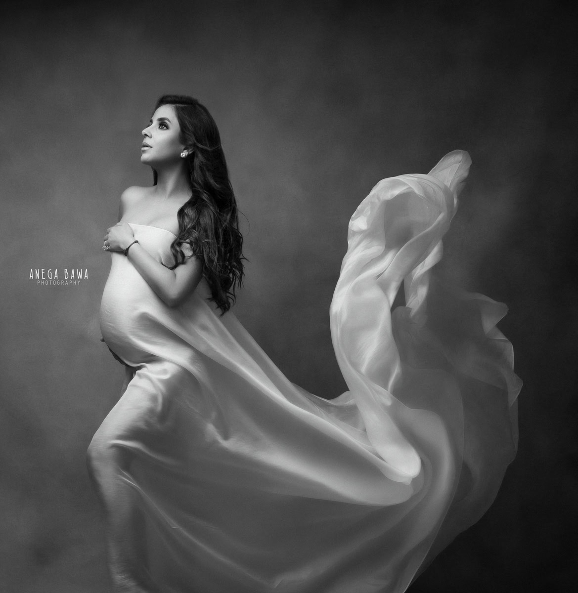 Pregnancy Photographer in Delhi: White Wrap, Grey Backdrop, by Anega Bawa Photography, Gurgaon Noida.
