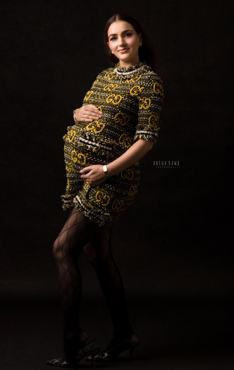 Pregnancy Photography in Delhi: Yellow Gucci Black Tunic, Black Backdrop, by Anega Bawa, Photographer Gurgaon Noida.
