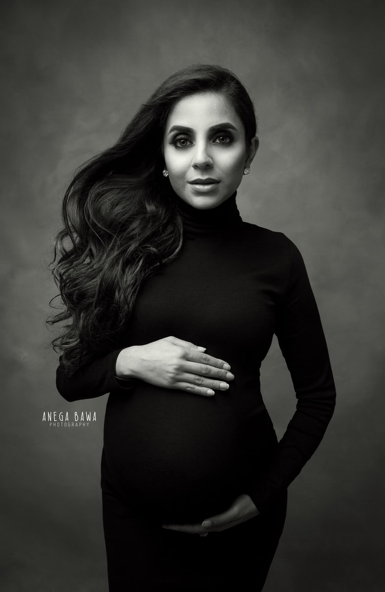 Pregnancy Photoshoot in Delhi: Black High Neck, Grey Backdrop, by Anega Bawa Photography, Gurgaon Noida.
