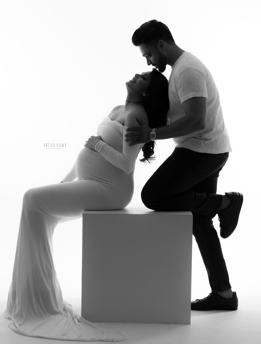 Elegant maternity and couple photography in black and white, capturing love and connection, by Anega Bawa Photography.