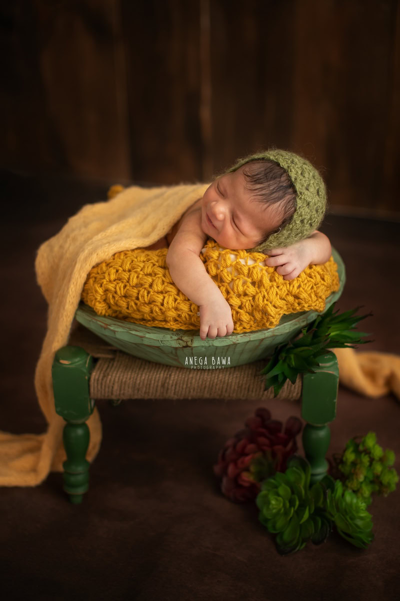 Newborn Photographer in Delhi: Yellow Wrap, Sunflower Shoot, Brown Backdrop, by Anega Bawa Photography, Gurgaon Noida.
