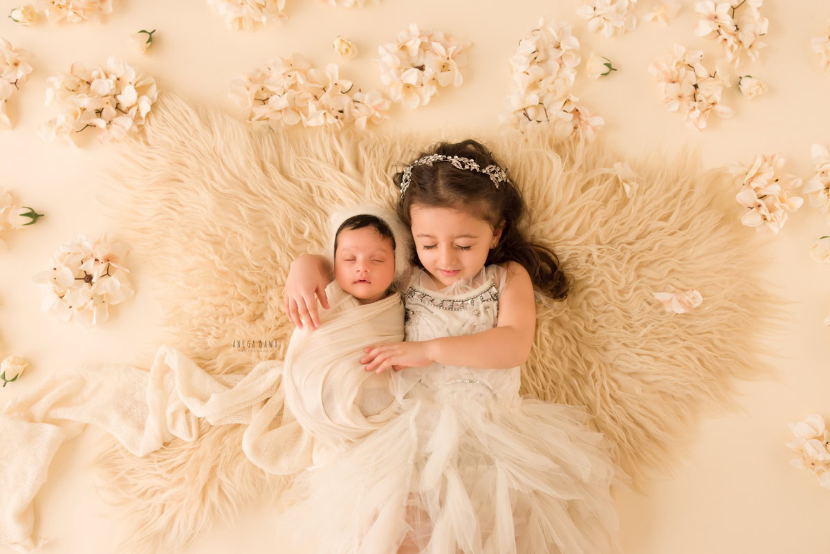Newborn Photography in Delhi: Beige Wrap, Sibling, Beige Rug, Beige Backdrop, by Anega Bawa Photographer, Gurgaon Noida.