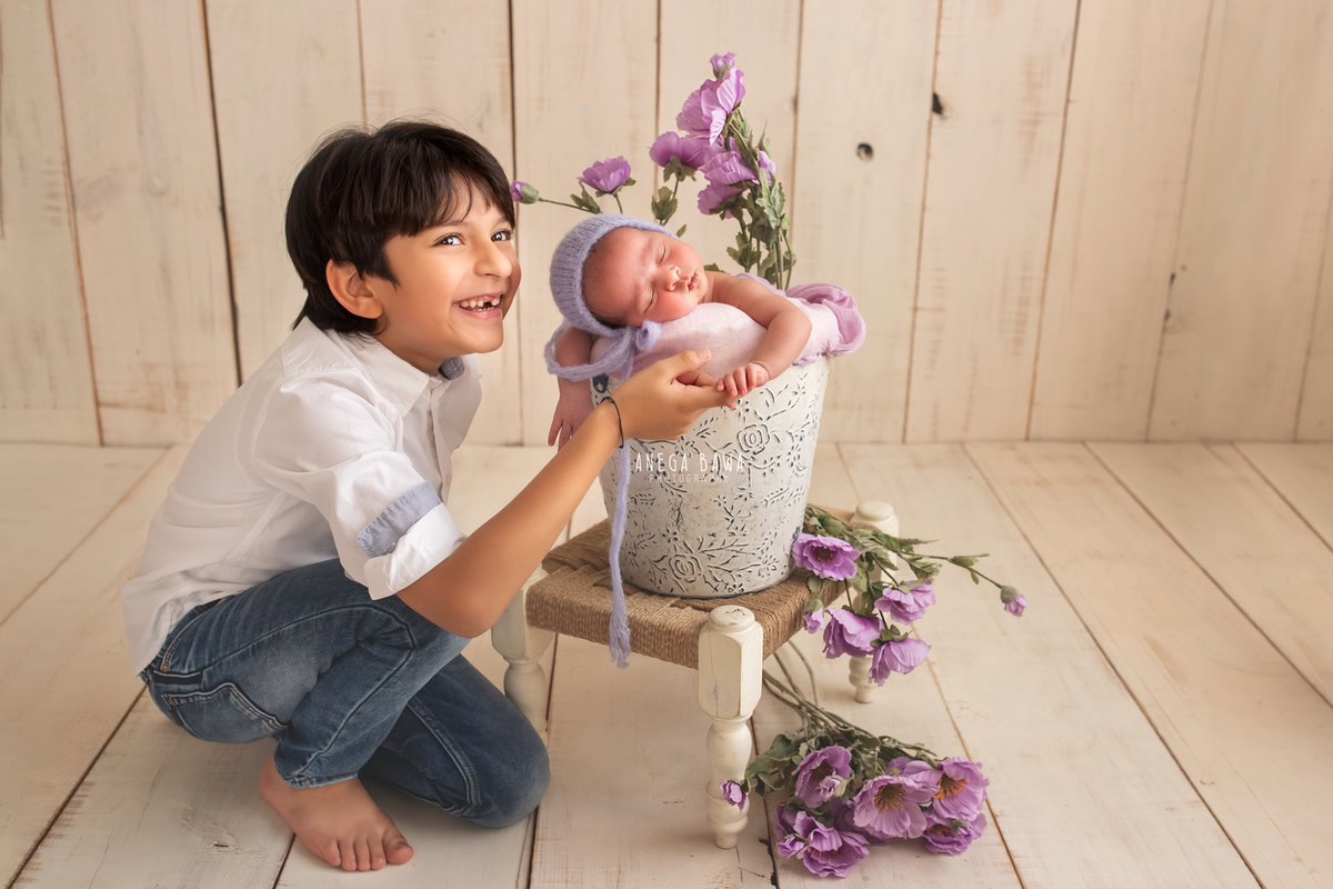 Newborn Photography in Delhi: Blue Cap, Sibling, Beige Backdrop, by Anega Bawa Photographer, Gurgaon Noida.