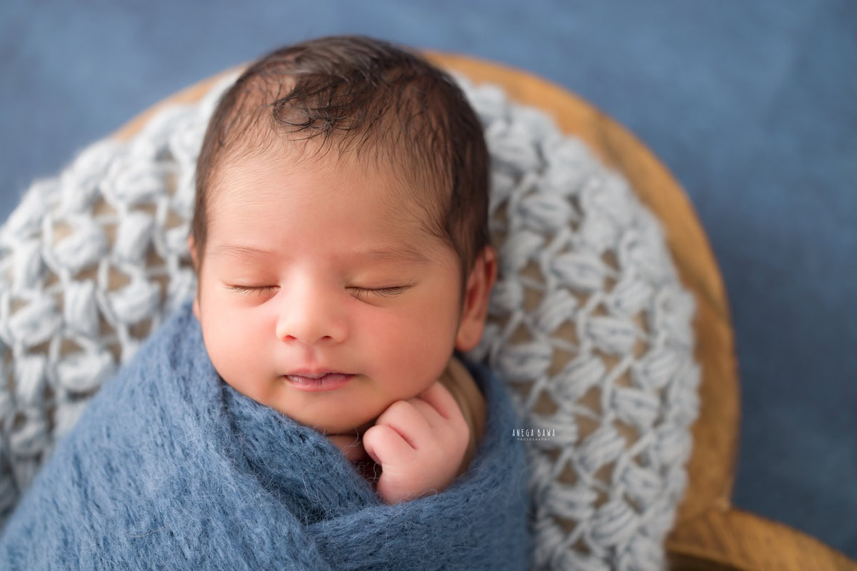 Newborn Photography in Delhi: Blue Wrap, Blue Backdrop, by Anega Bawa Photographer, Gurgaon Noida.