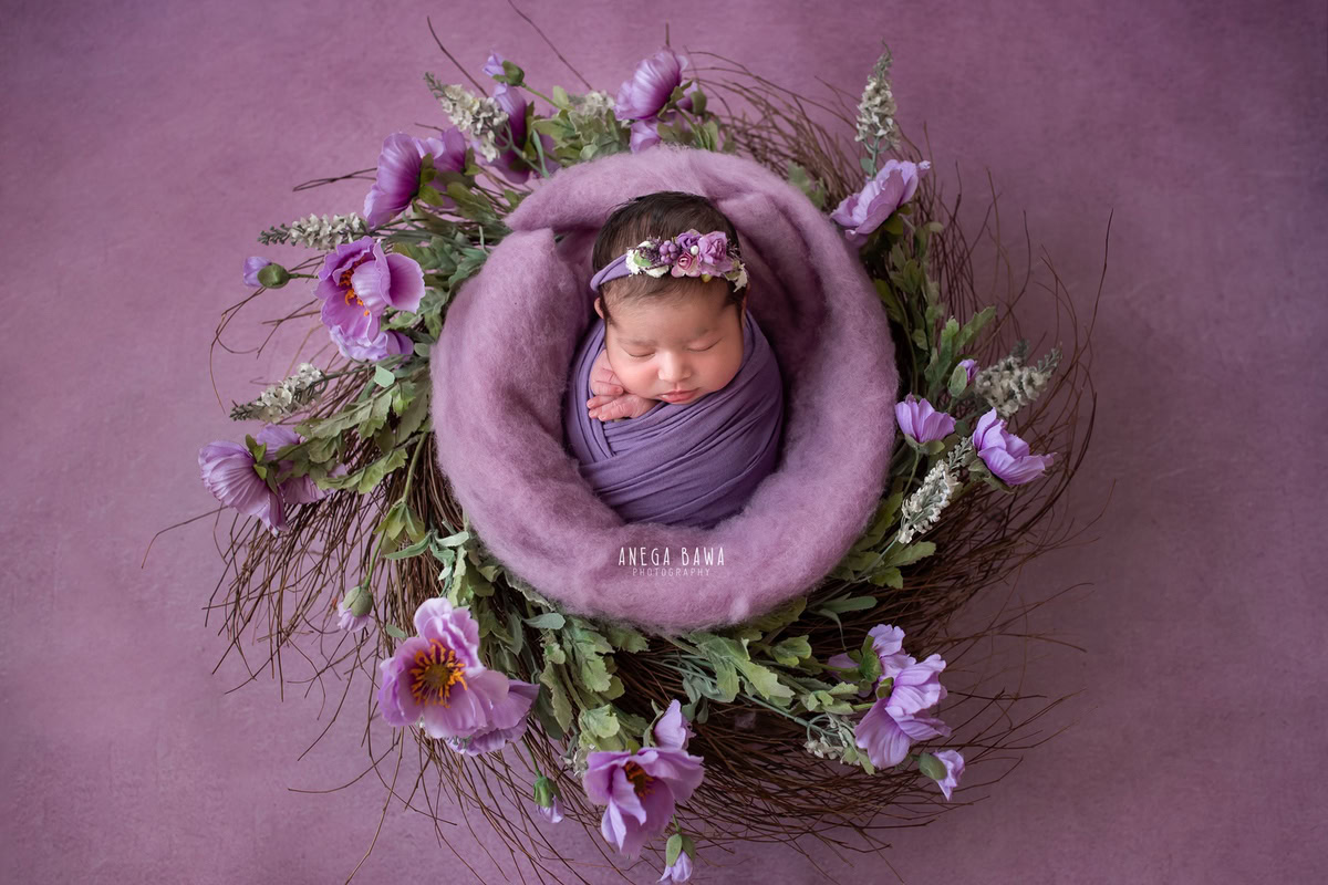 Newborn Photography in Delhi: Blue Wrap, Lavender Floral Basket, Lavender Backdrop, Cute Headband, by Anega Bawa Photographer, Gurgaon Noida.
