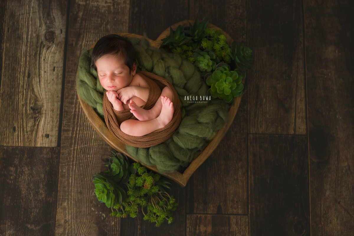 Newborn Photography in Delhi: Brown Wrap, Brown Backdrop, Cute Sleeping Pose. Photographer: Anega Bawa, Gurgaon Noida.