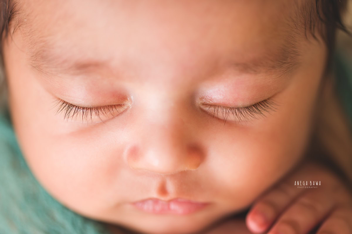 Newborn Photography in Delhi: Close-up of a cute nose captured by Anega Bawa during a photoshoot in Gurgaon Noida.
