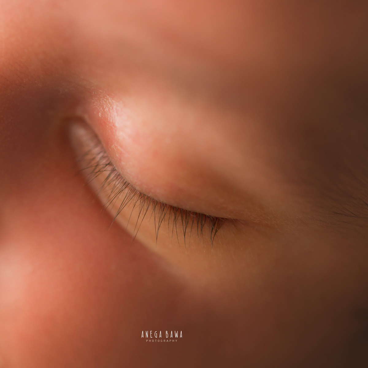 Newborn Photoshoot in Delhi: Close-up of adorable eyelashes. Photographer: Anega Bawa Photography, Gurgaon Noida.