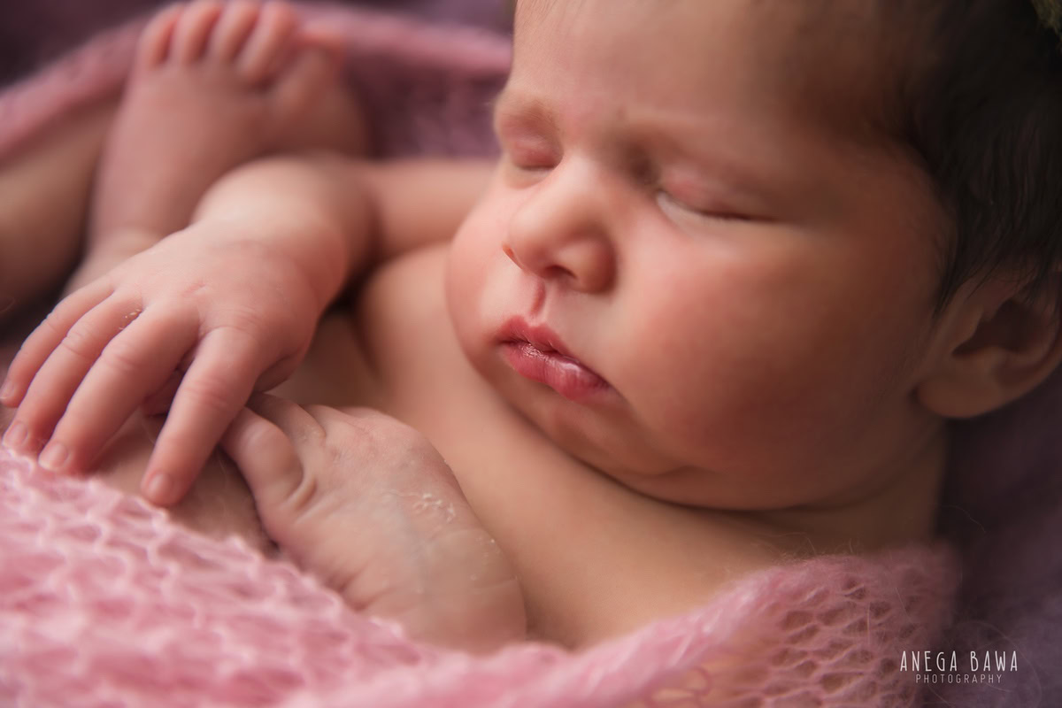 Newborn Photoshoot in Delhi: Pink Wrap with Pink Backdrop. Photographer: Anega Bawa Photography, Gurgaon Noida.