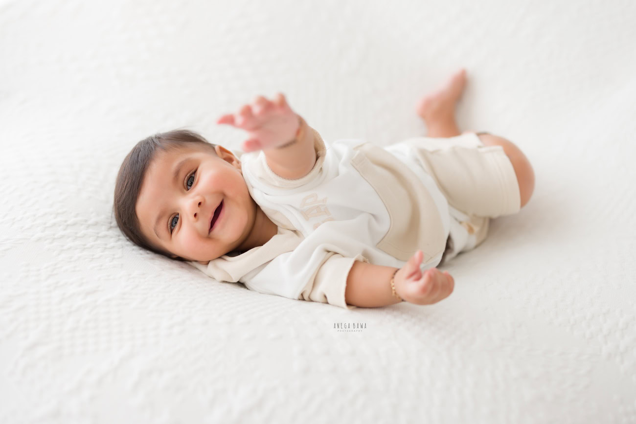 baby-boy-photography-5-4-3-6-months-white-backdropcute-lying-pose-delhi-gurgaon-noida-anega-bawa