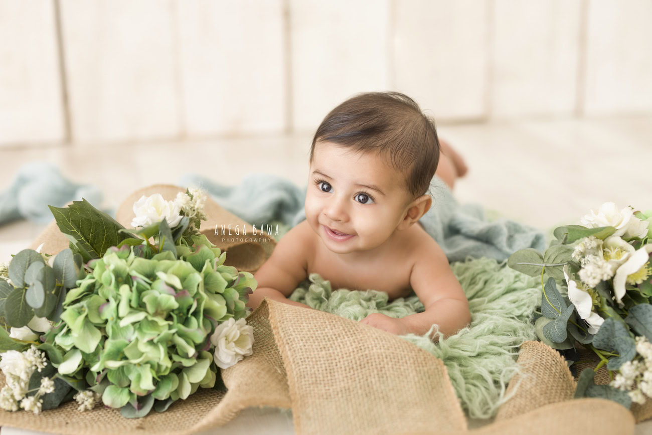 Baby boy photoshoot, 6, 5, 4, 3 months, green rug, beige backdrop. Location: Delhi, Gurgaon, Noida. Photographer: Anega Bawa.