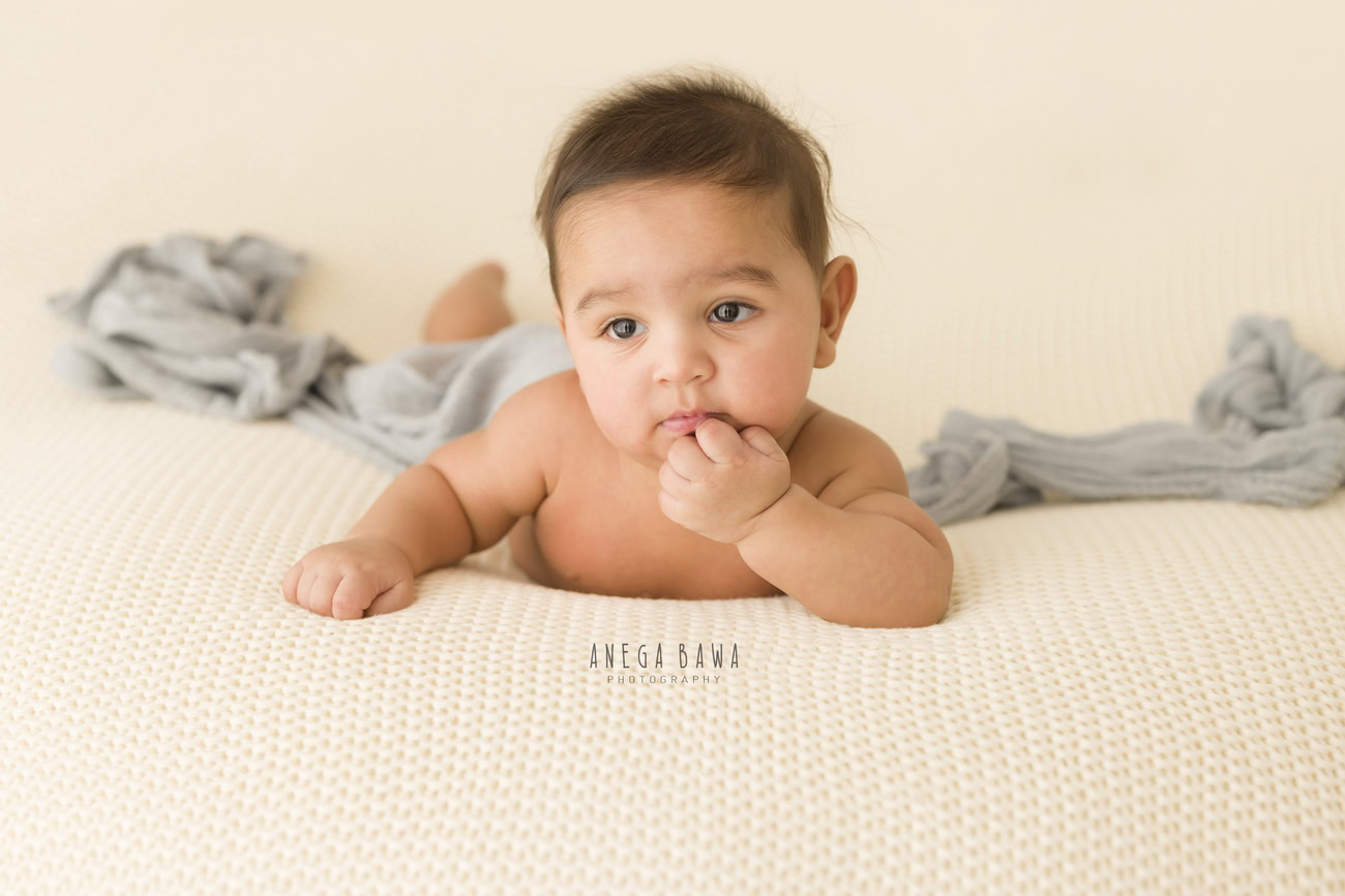 Baby boy photoshoot, 6 or 5 or 4 or 3 months, grey sheet, white backdrop, Delhi Gurgaon Noida, Anega Bawa.