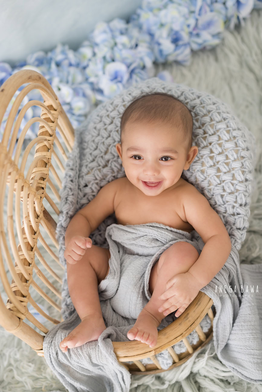 Baby boy photoshoot, 6, 5, 4, 3 months, wooden chair, grey wrap, blue flowers, blue backdrop, Delhi, Gurgaon, Noida, Anega Bawa.