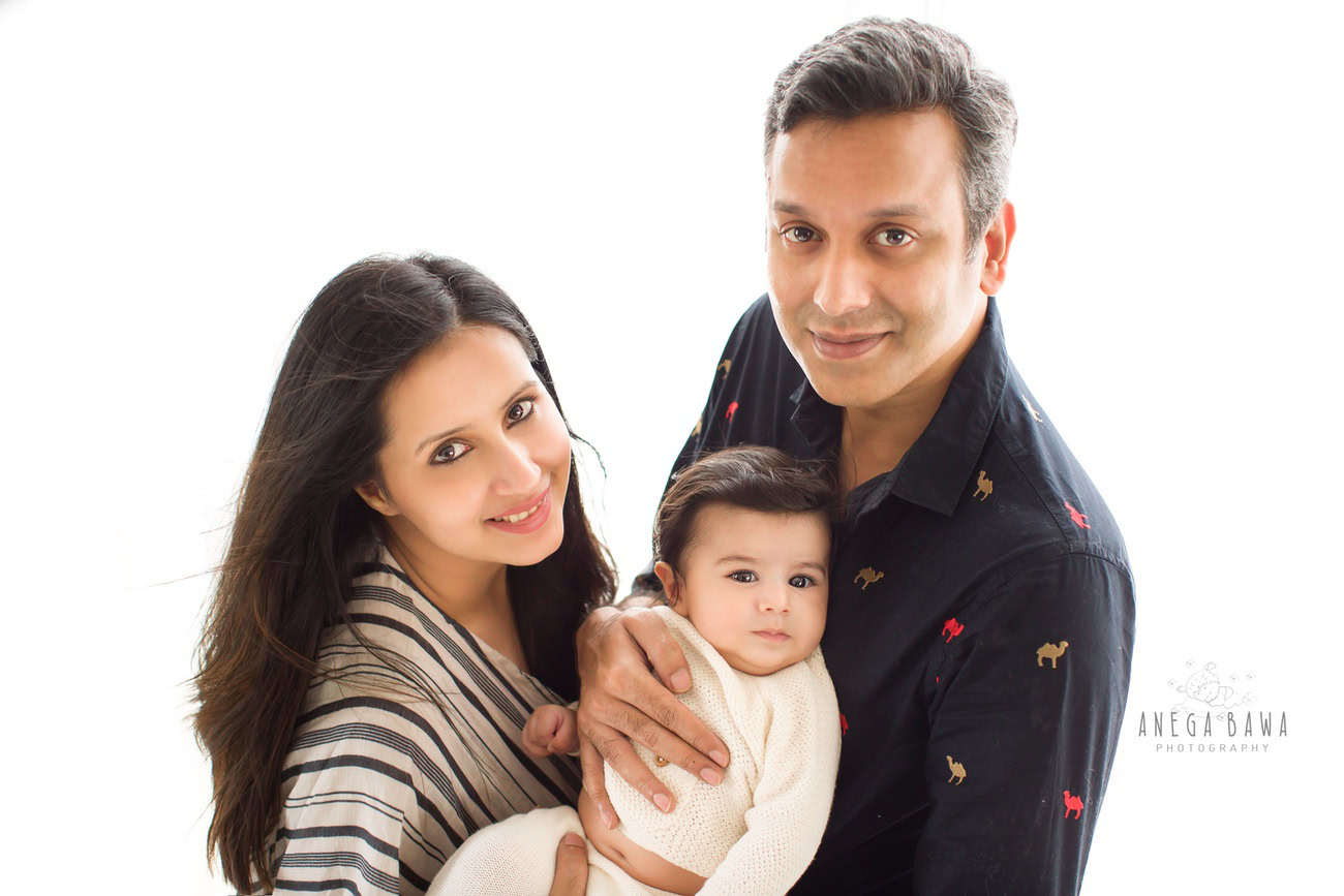 Anega Bawa Photography in Delhi and Gurgaon invites you to capture those precious family moments with Mumma, Papa, and their adorable little boy against a pristine white backdrop. Let us create timeless memories that you'll treasure forever.