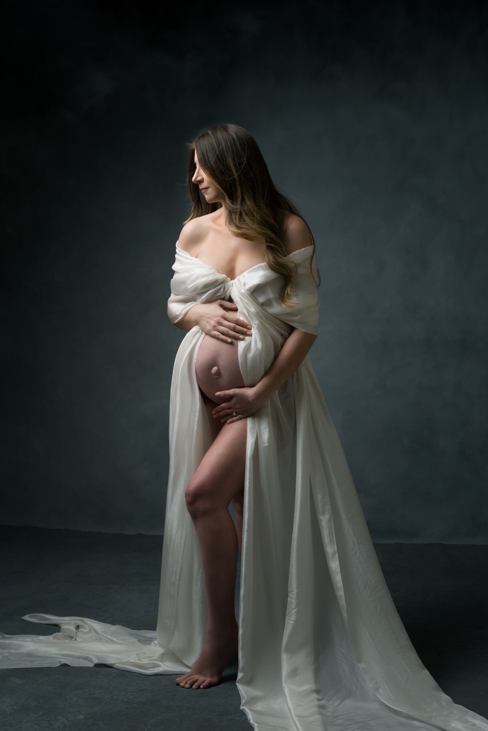 Maternity portrait in ivory gown